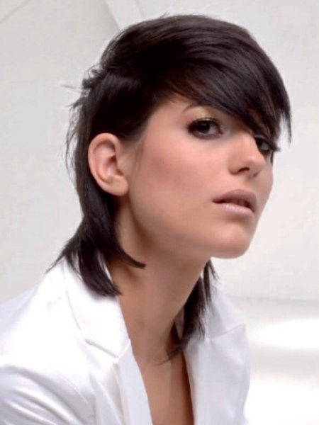 Medium-length hair cut lightly tapered on the sides