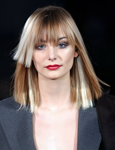 Shoulder-length blunt cut hairstyle with a fringe