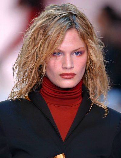 Layered shoulder length hairstyle and a turtleneck
