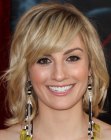 Alison Haislip wearing her medium length hair with the sides styled away from her face