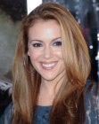 Alyssa Milano wearing her hair long with smoothed out layers