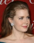 Amy Adams with her long hair styled away from her face