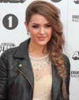 Anna Passey sporting a long braided side ponytail
