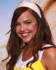 Arielle Kebbel wearing her hair long and styled with a hair scarf