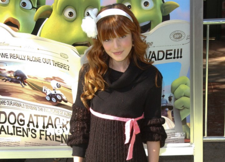 Bella Thorne wearing a knitted dress with a loose turtleneck
