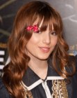 Bella Thorne wearing a small bow in her hair