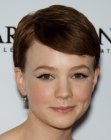 Carey Mulligan with her hair cut around her ears in a pixie