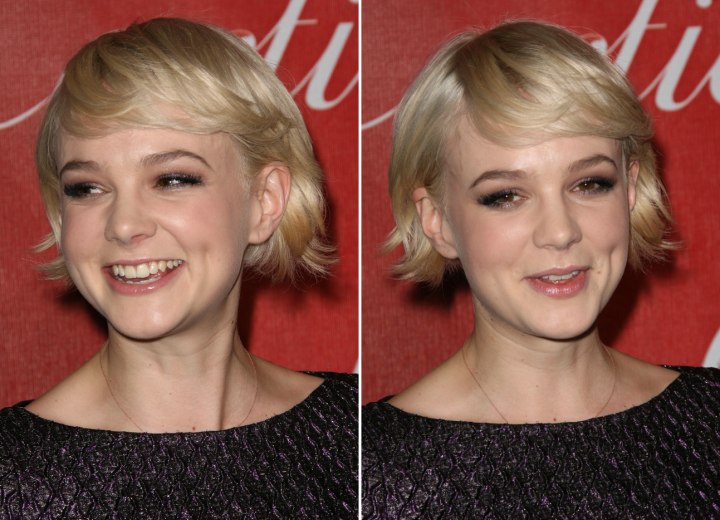 Carey Mulligan with her short hair tucked behind her ears