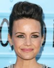 Carla Gugino's with her hair styled into a fake pixie cut