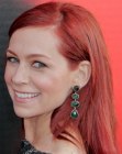 Carrie Preston wearing her red hair past the shoulders