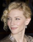 Cate Blanchett with her hair up in a bun with curls