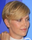Charlize Theron rocking a trendy pixie cut with bangs