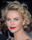 Charlize Theron's glamorous short hairstyle with curls