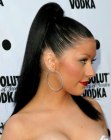 Christina Aguilera sporting a very tight high ponytail look