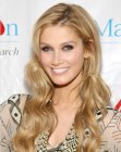 Delta Goodrem's very long hair with waves and bounce