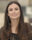 Demi Moore aged over 40 and wearing her hair very long and straight