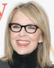 Diane Keaton wearing her hair in a shoulder length cut and brushed to one side