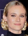 Diane Kruger wearing her hair up with braiding