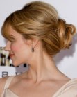 Dianna Agron's updo with a knot along the nape