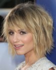 Dianna Agron wearing her hair in a mixture of a shag and a bob
