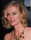 Eileen davidson with her medium length hair styled into curls