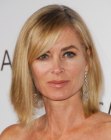 Eileen Davidson with her hair cut in a medium length style with side bangs