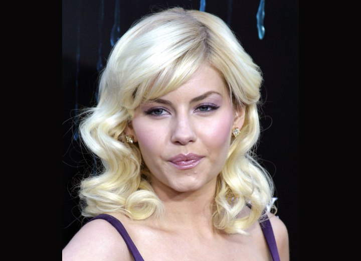 Elisha Cuthbert - Long curled hairstyle with round bangs