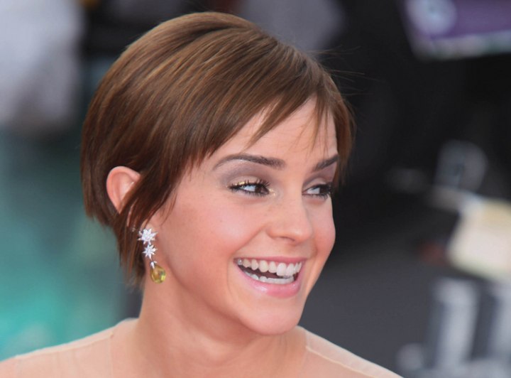 Emma Watson with her hair cut in a pixie