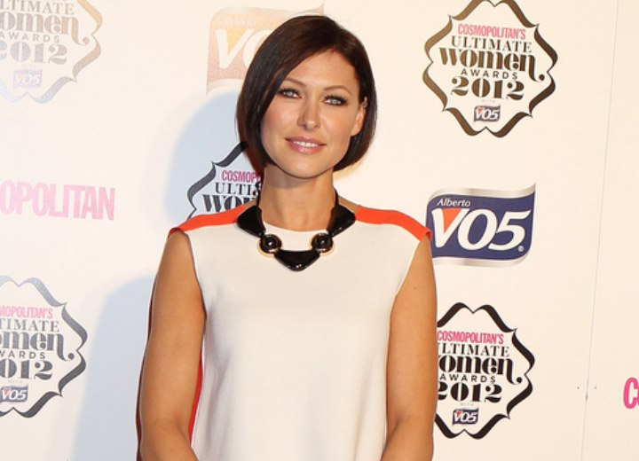 Emma Willis wearing slacks and a trendy top