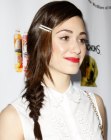 Emmy Rossum wearing her hair in a braided side ponytail