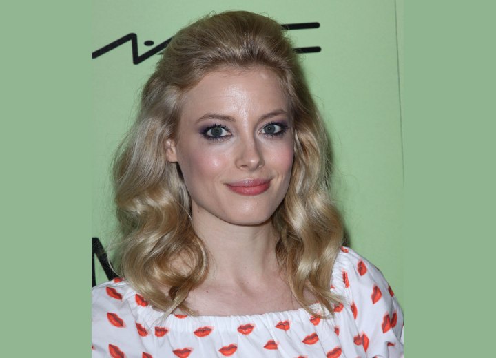 Gillian Jacobs with her top hair brushed back
