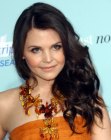 Ginnifer Goodwin's long layered hair with lush waves and curls