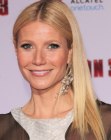 Gwyneth Paltrow with her hair past her shoulders and swept to one side