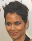Halle Berry with her hair cut short around her ears for a pixie look