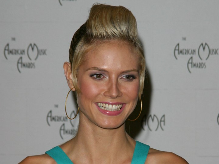 Heidi Klum with her hair in an updo with a high and puffy crown