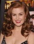 Isla Fisher with curly hair in a vintage inspired style