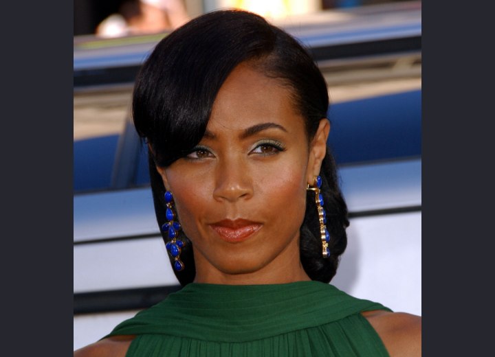 Jada Pinkett with her hair styled for an elegant look