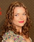 Jaime King sporting a long hairstyle with Shirley Temple curls
