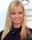 Jaime Pressly sporting a simple long hairstyle with bangs