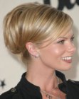 Jaime Pressly's updo with her hair tucked under in the back