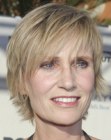 Jane Lynch with her hair cut into a comfortable short style