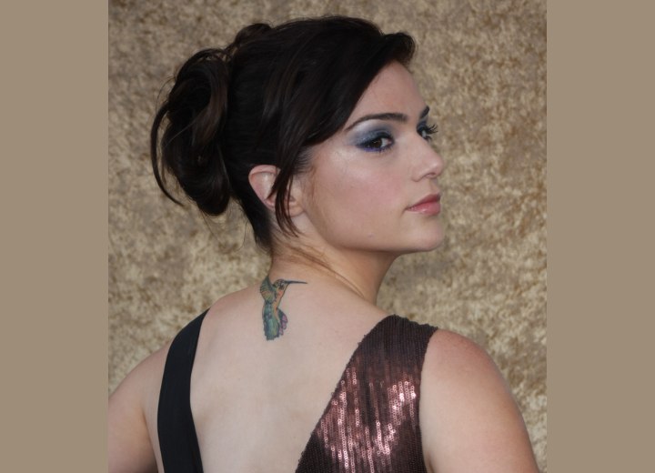 Janet Montgomery wearing her hair in an updo