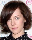 Jena Malone wearing her hair cut short at jaw length