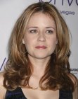 Jenna Fischer's long hair with curls around the shoulders