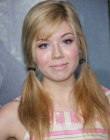 Jennette McCurdy with her hair styled in adorable pigtails