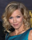 Jennie Garth with her medium length hair styled into curls for a special occasion