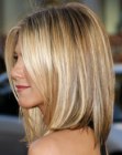 Jennifer Aniston's medium length hair with angled sides and sleek styling