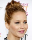 Jennifer Lawrence sporting a top knot with a messy bun