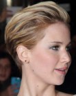 Jennifer Lawrence's pixie cut with her hair swept back away from her face