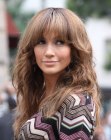 Jennifer Lopez sporting natural dark brown hair with highlights